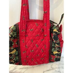 Vera Bradley small duffle style handbag in the retired red Holly pattern.